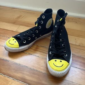 High top converse with smiley face detail